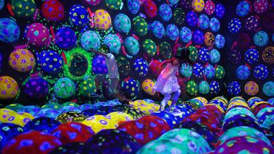 'Rapidly Rotating Bouncing Sphere Caterpillar House' by teamLab.