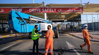Cleaning begins at the circuit's main entrance. Victor Besa / The National