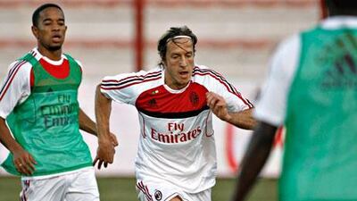 Midfielder Massimo Ambrosini, the AC Milan captain, says Manchester City's owners must exert patience in building their club.