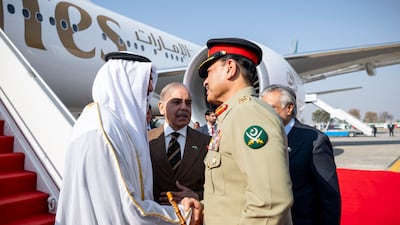 President Sheikh Mohamed is greeted by Asim Munir, Pakistan's Chief of Army Staff. Hamad Al Kaabi / UAE Presidential Court