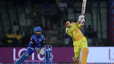 Chennai Super Kings captain MS Dhoni hits a six on his way to an unbeaten 32 in the win over Delhi Capitals. AP Photo