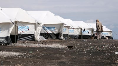 An internally displaced man who fled Raqqa walks near tents at a camp in Ain Issa on April 1, 2017. Rodi Said / Reuters