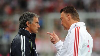 In this file photo from 2010, Louis van Gaal, right, then coach at Bayern Munich and Jose Mourinho, who was Real Madrid coach at the time, chat before their friendly at the Allianz Arena stadium in Munich, Germany. EPA/ANDREAS GEBERT