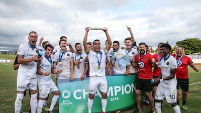 Team Wellington players celebrate winning the Oceania Champions League on Sunday. Handout image