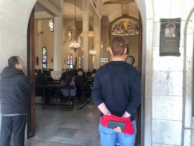 Christians at an Easter Sunday service in Beirut. Aya Iskandarani for The National.