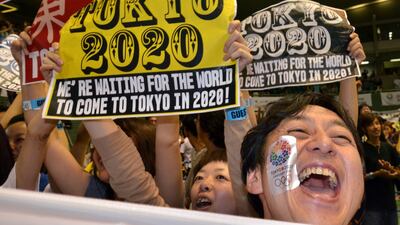 No such problems in Tokyo with people seemingly happy with the way the Abe administration has governed this past year. The bid may infuse a new hope in the Japanese people with regard to their economy. Yoshikazu Tsuno / AFP