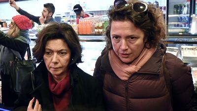 Turkish sociologist Ayse Bugra (L), wife of Turkish leading businessman and rights defender Osman Kavala, reacts after Istanbul prosecutors issued a new arrest warrant for Kavala, as part of a separate probe after his acquittal earlier in the day. AFP