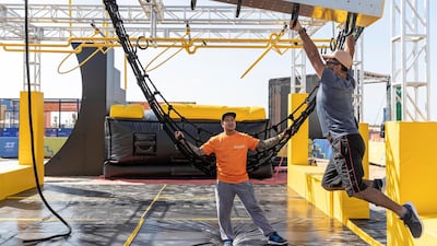Public sector employees get fit with a 3 kilometre obstacle exercise on Hudayriat island