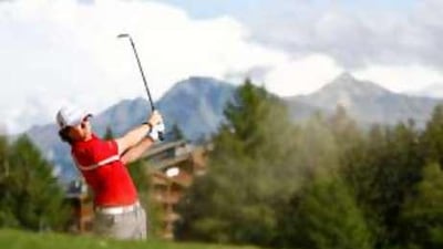 Rory McIlroy plays out of a bunker during the final round of the European Masters on Sunday.
