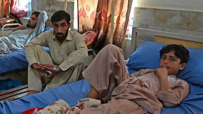 A boy recovers from injuries sustained in the July 30 suicide bombing in Pakistan's Bajaur. AFP
