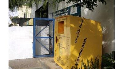 A clothes drop box in Dubai collect items bound for Africa, though the donated clothes are in turn sold for profit. One readers argues that more transparency is needed in such business dealings. Mike Young / The National