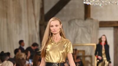 Gold was a key colour in the collection. AFP