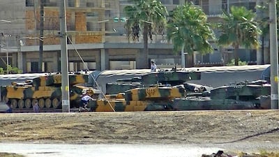 Turkish tanks are arriving at the Iskenderun train-port on October 7, 2017 at Iskendurun district in Hatay. Dogan News Agency / AFP