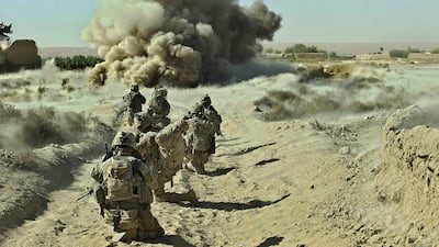 An operation by US soldiers at Zangabad base in Panjwai district, Kandahar, after roadside bombs were detonated at Naja-bien village, in September 2012. AFP