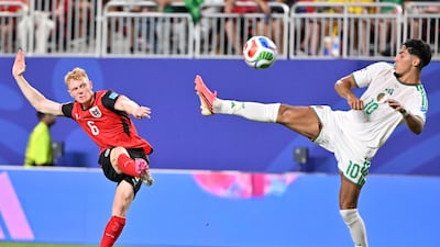 Nicolas Seiwald of Austria, left, in action against Fares Chaibi of Algeria in Kansas City. EPA