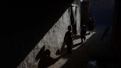 Afghan children walk through the old section of Jalalabad in Nangarhar province, Afghanistan. Noorullah Shirzada / AFP