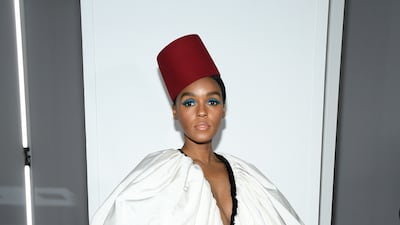 Janelle Monae, wearing over-sized white Giambattista Valli, attends the label's Paris Fashion Week show on March 4, 2019. Getty Images