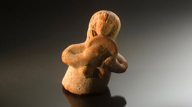 An iron age statuette of a woman with a tambourine, from between 800 and 601 BC, discovered in Gaza. Photo: Alberto Ricci