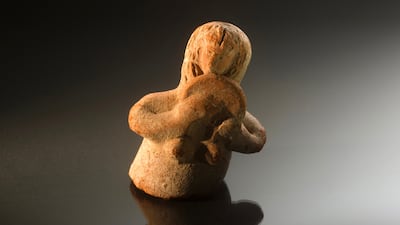 An iron age statuette of a woman with a tambourine, from between 800 and 601 BC, discovered in Gaza. Photo: Alberto Ricci