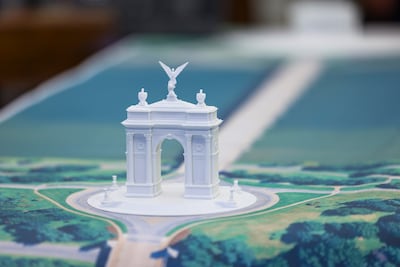 A model of the Triumph Arch shown during a press conference in the Oval Office. EPA