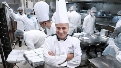 Executive chef Georges Gerayel in the kitchen as he oversees the staff at the Armed Forces Officers Club & Hotel in Abu Dhabi as the prep the food that will feed thousands daily at the Zayed Grand Mosque. Delores Johnson / The National