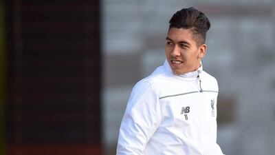 epa05178823 Liverpool player Roberto Firmino attends a training session at Melwood training facility in Liverpool, Britain, 24 February 2016. Liverpool FC play FC Augsburg at Anfield on the 25 February 2016 in an UEFA Europa League round of 32 match. EPA/PETER POWELL .