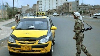 A Yemeni soldier mans a checkpoint at a street as authorities tighten up security measures in Sanaa.