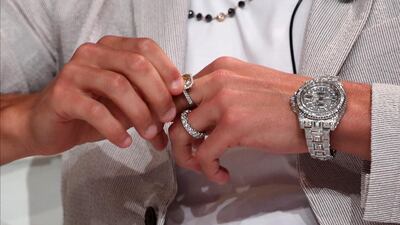 Cristiano Ronaldo wore a super expensive Rolex diamond-studded GMT-Master Ice during the Dubai International Sports Conference in December 2019. It cost about $485,000 (Dh1.8 million) with nearly 30 carats diamonds. Add to it a diamond band and a canary diamond ring on his middle finger, and the cost of the items on Ronaldo's hands were estimated at Dh3 million. EPA