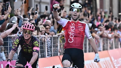 French rider Benjamin Thomas of Cofidis team celebrates winning the 5th stage of the Giro d'Italia 2024, a cycling race over 178 km from Genova to Lucca, Italy, 08 May 2024. EPA / LUCA ZENNARO