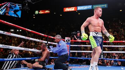 Canelo Alvarez walks to his corner after knocking out Sergey Kovalev in the 11th round of their WBO light heavyweight bout in Las Vegas. AP