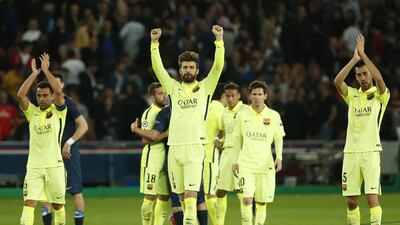 Barcelona players acknowledge fans after beating Paris Saint-Germain in the Champions League quarter-final first leg on Wednesday. Benoit Tessier / Reuters / April 15, 2015