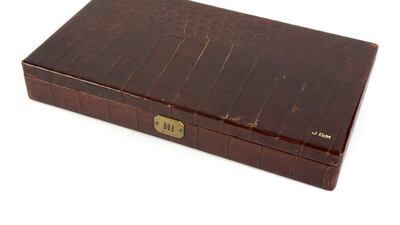 An alligator men’s accessory case, owned by Marilyn Monroe’s second husband, American baseball player, Joe DiMaggio, with monogrammed “JDim” on the bottom. The combination lock closure is set to 555, a nod to DiMaggio’s Yankee jersey number five. Courtesy Julien's Auctions