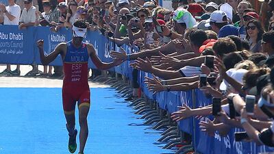 Mario Mola from Spain finishing first in Elite Men’s 2016 ITU World Triathlon yesterday on Abu Dhabi Sailing and Yacht Club on Breakwaters. Ravindranath K / The National