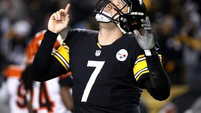 Pittsburgh Steelers quarterback Ben Roethlisberger looks skyward after completing a touchdown pass to wide receiver Antonio Brown during his team's NFL win over the Cincinnati Bengals on Sunday. Gene J Puskar / AP / December 28, 2014