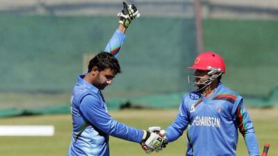 Usman Ghani, 17, left, made 118 and 43 runs in Afghanistan's two ODIs against Zimbabwe. Jesekai Njikizana / AFP / July 20, 2014