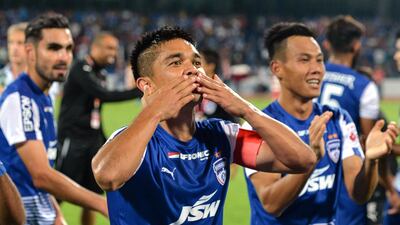 India captain Sunil Chhetri, seen here in a Bengaluru FC shirt, has asked supporters to come to the stadium to watch their team in action. Manjunath Kiran / AFP