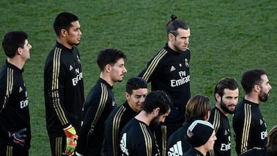 Real Madrid players at the public training session. AFP