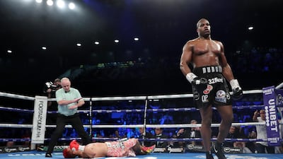 British fighter Daniel Dubois walks away after knocking out Kyotaro Fujimoto of Japan during the WBC Silver and WBO international heavyweight title fight at Copper Box Arena in London on Saturday, December 21. Getty