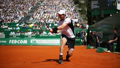 Britain’s Andy Murray retuns the ball to Spain’s Rafael Nadal in the Monte-Carlo ATP Masters Series Tournament semi-final match, on April 16, 2016 in Monaco. Nadal won the match 2-6, 6-4, 6-2. AFP PHOTO / JEAN CHRISTOPHE MAGNENET