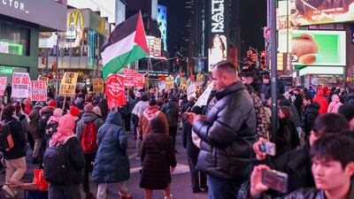 Palestinian supporters march in Times Square in response to U. S. President Donald Trump's remarks last week on his plans for the U. S. to "own" the Gaza Strip in New York. EPA