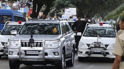 Former chief minister of India’s Tamil Nadu state Jayaram Jayalalitha travels in a car accompanied by an entourage of vehicles with red beacon lights after being released from a prison in Bangalore, India. Prime minister Narendra Modi’s cabinet announced on April 19, 2017, that the red beacon lights signalling the presence of a VIP on the road will be reserved for emergency vehicles only starting May 1. Aijaz Rahi / Associated Press, file / October 18, 2014