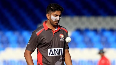 Junaid Siddique prepares to bowl against the USA against the USA. Satish Kumar / The National