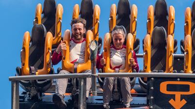 Justin Mould and Marnie Woolrich carry the baton on a rollercoaster as it visits Alton Towers. Getty Images