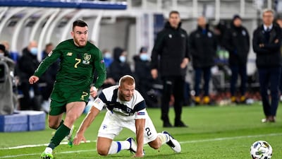 Republic of Ireland's Aaron Connolly, left, and Maulus Arajuuri of Finland. PA