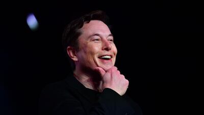 Mr. Musk speaks during the unveiling of the new Tesla Model Y. AFP