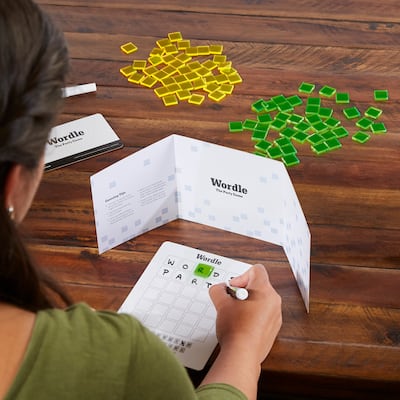 Players must compete against each other to solve the word puzzle in six guesses. Photo: Hasbro