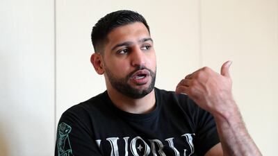 Amir Khan is aiming to bring mega boxing events in Dubai. Pawan Singh / The National