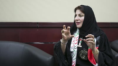 Dr Eman Al Jaberi ‘took a theoretical approach while teaching law and now the practical as a lawyer’. Mona Al Marzooqi / The National