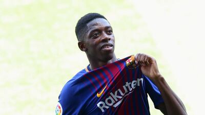 Ousmane Dembele became the second most expensive player after completing a €105m deal that could rise to €147m with add-ons from Borussia Dortmund. Albert Gea / Reuters