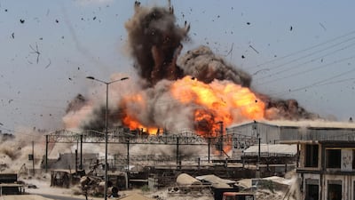 A fireball rises during an Israeli strike in central Gaza. AFP